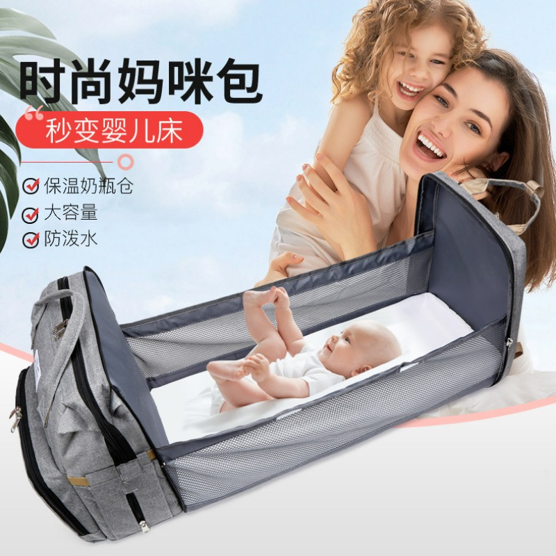 Fashionable Folding Baby Crib  - Backpack Diaper Bag reseña y precio