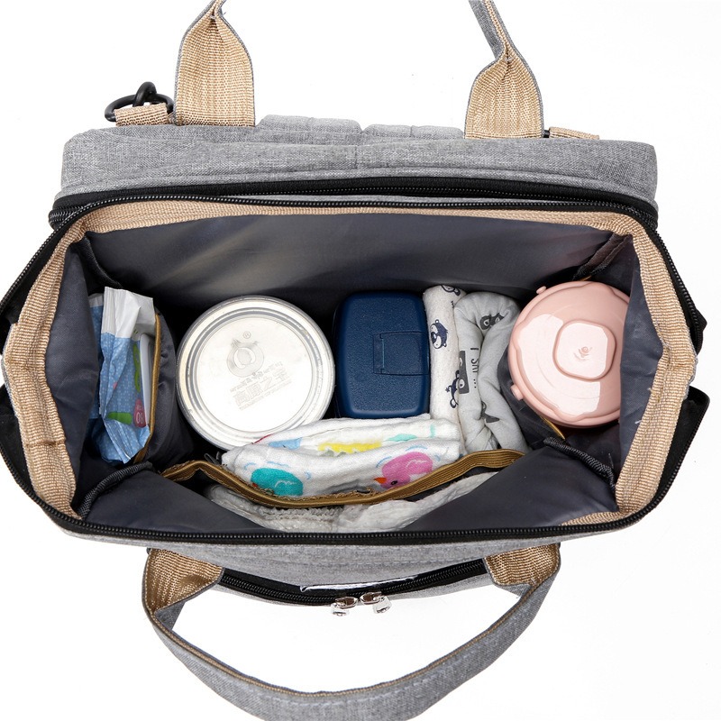 Fashionable Folding Baby Crib  - Backpack Diaper Bag reseña y precio